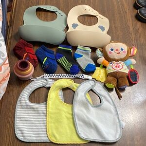 “5/$20” baby bundle of goodies! Stuffed animal, nesting cups, bibs and socks!